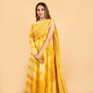 Yellow color tiendye gown with drape dupatta